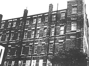 Black and White image of Raine Street Workhouse in London